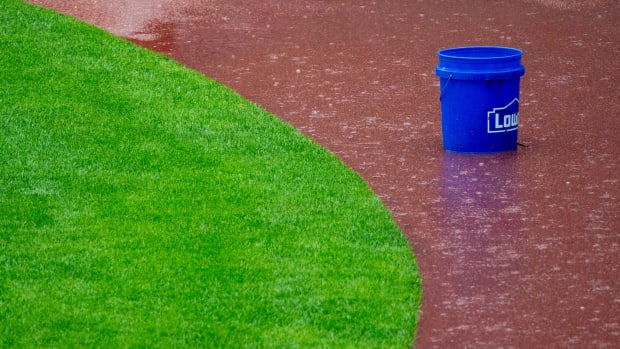 Reds rain out delay